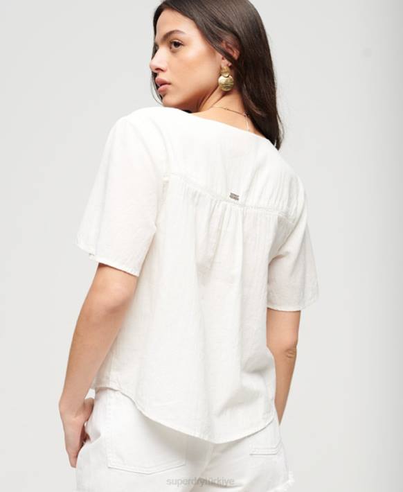 kadınlar Superdry krem kısa kollu işlemeli düğme top NNTB2078